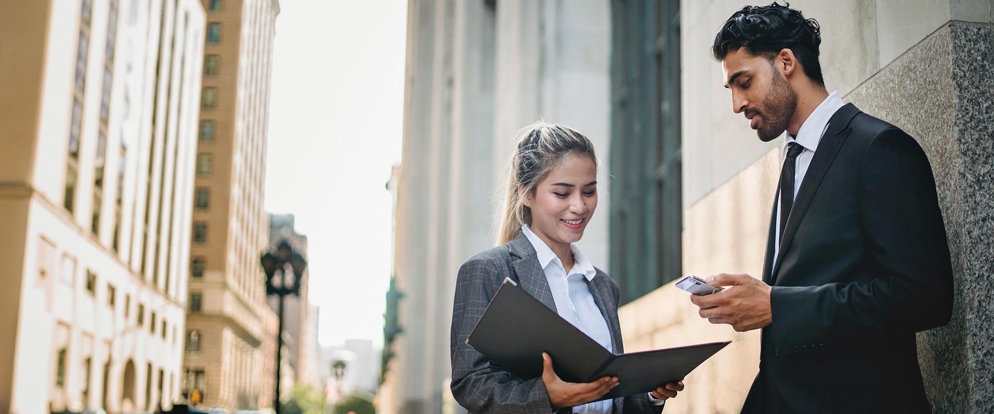Two People Meeting in Street